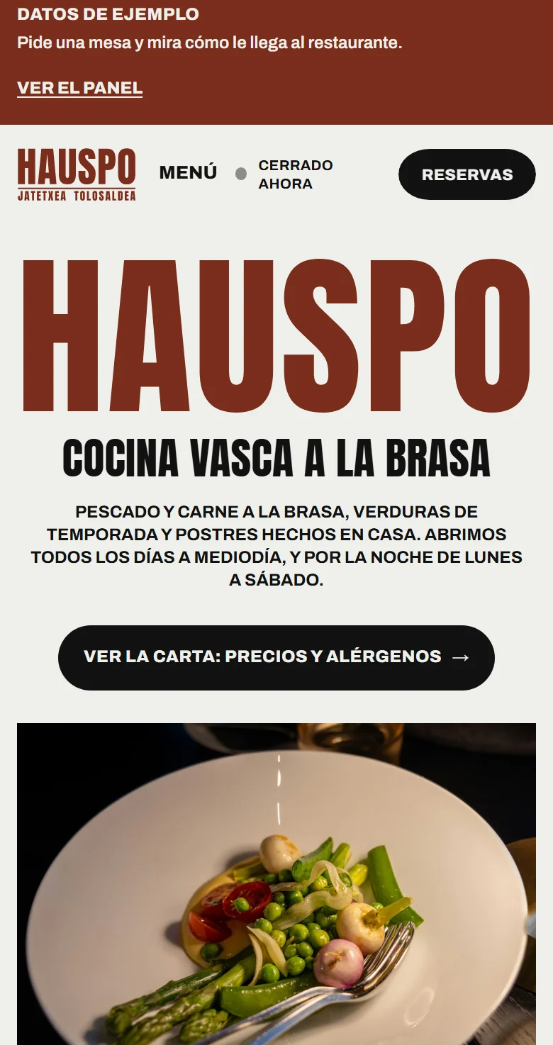 Web de HAUSPO, restaurante inventado, con el botón de reservas